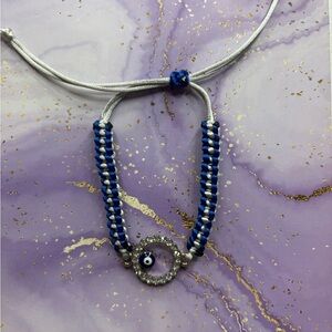 Handmade nylon satin adjustable bracelet with evil eye charm